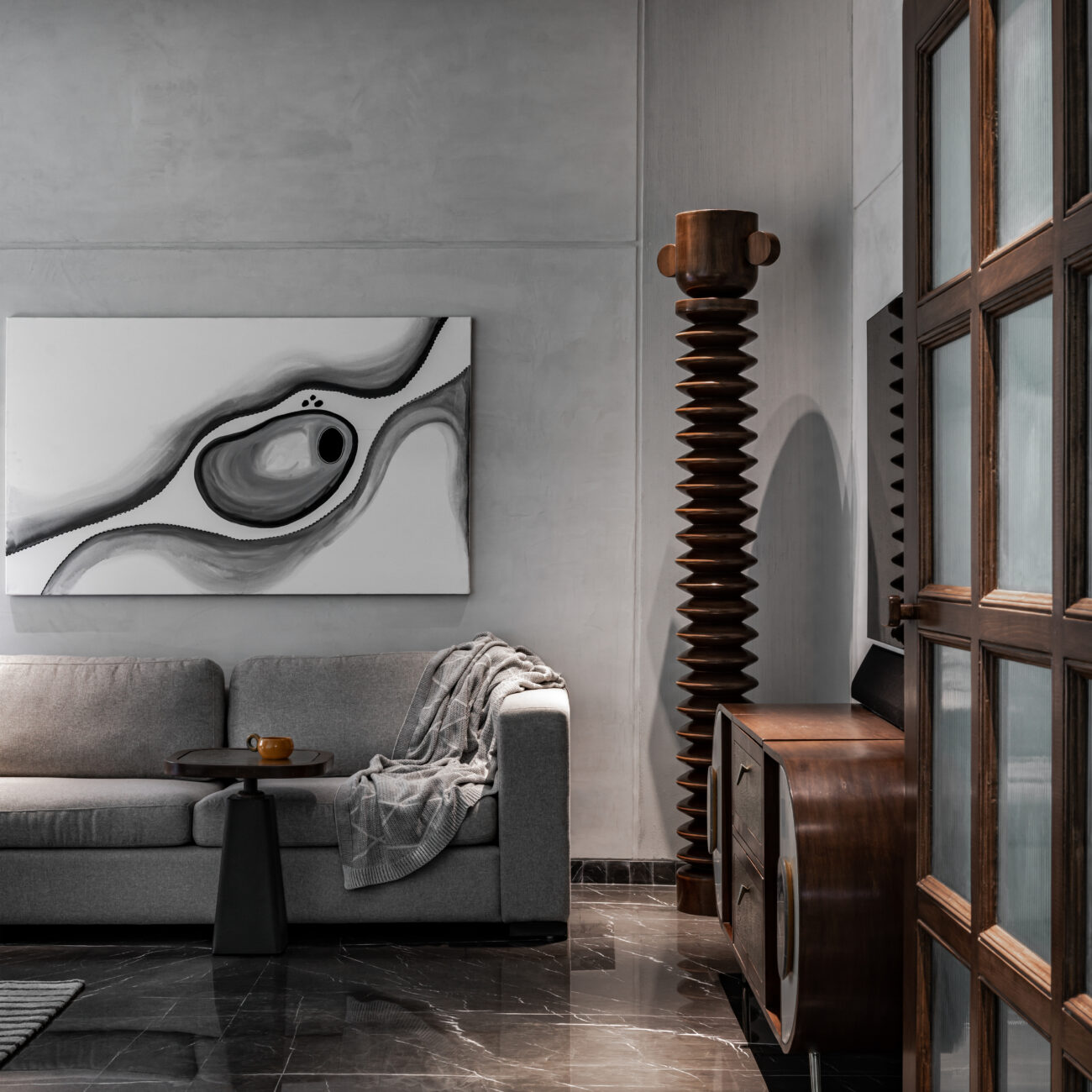 Cordkraft Design Studio’s LAAD-5 in Ahmedabad is a monochrome retreat defined by a handcrafted ceiling mural